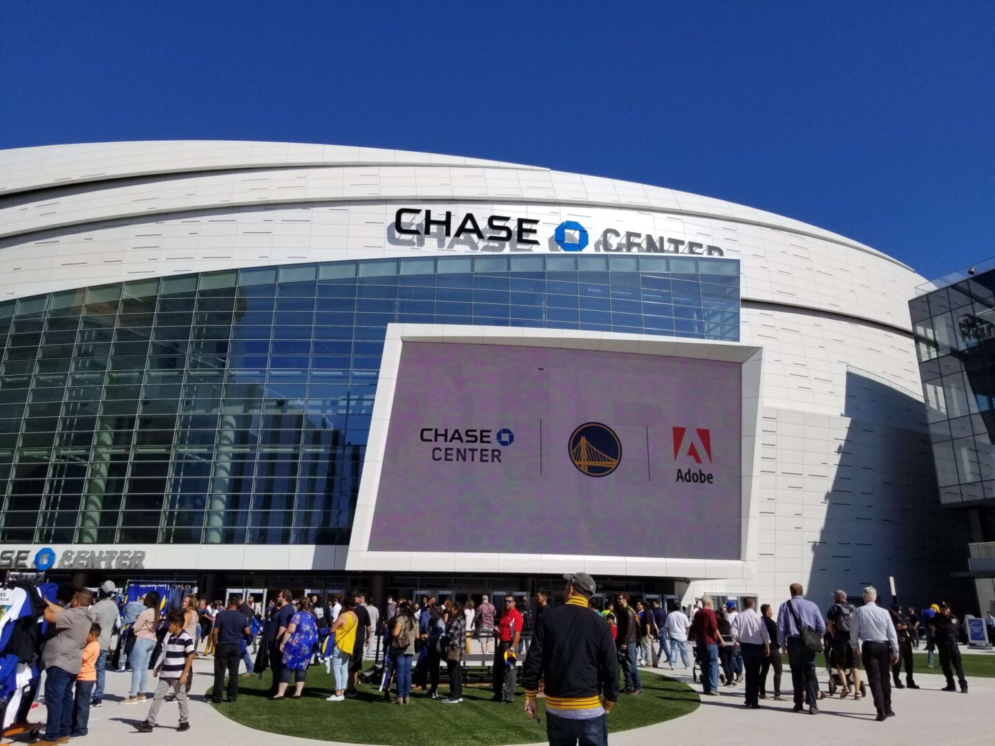 Outside view of chase center filled with people